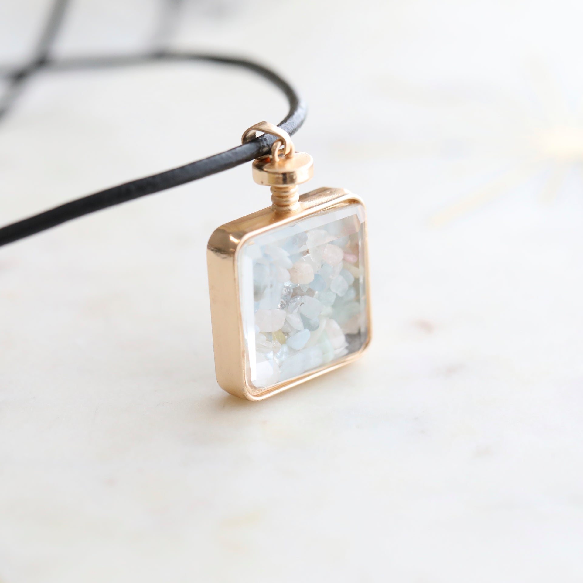 Close-up of Morganite Crystal Pendant Perfume Bottle Necklace – Italian Leather Cord with 18K Gold