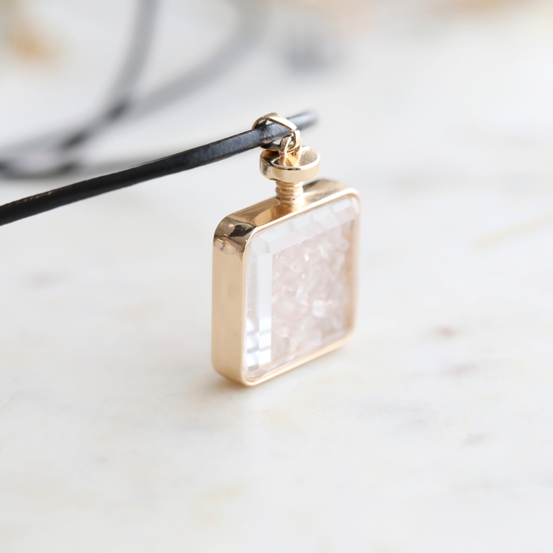 Close-up of Rose Quartz Crystal Pendant Perfume Bottle Necklace – Italian Leather Cord with 18K Gold